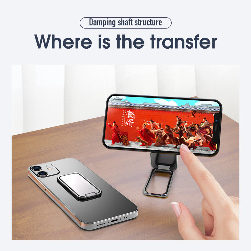 Foldable magnetic phone stand shown holding a smartphone on a desk