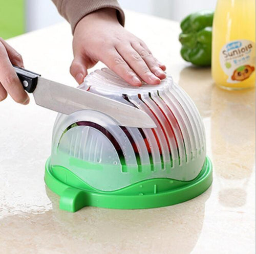 Creative salad cutter bowl with lid and 13 cutting seams for slicing fruits and vegetables safely